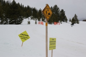 Caution: Sled Dog Race on Trail